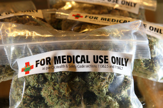 One-ounce bags of medicinal marijuana are displayed at the Berkeley Patients Group March 25, 2010 in Berkeley, California. California Secretary of State Debra Bowen certified a ballot initiative late Wednesday to legalize the possession and sale of marijuana in the State of California after proponents of the measure submitted over 690,000 signatures. The measure will appear on the November 2 general election ballot.