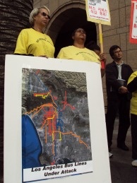 Members of the Bus Riders Union rallied out side L.A. Metro headquarters to call attention to the planned cuts to bus lines. They claim the reductions in service will disproportionally hurt poor and minority communities.