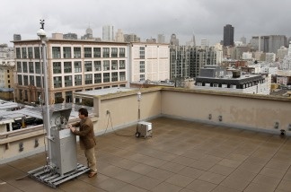 Eric Stevenson, director of technical services for the Bay Area Quality Management District, checks a radiation sensing device on March 23, 2011, in San Francisco.