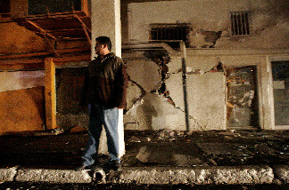 Alberto Montoya stands outside of his home after a 7.2 magnitude earthquake struck the area April 4, 2010 in Mexicali, Mexico.