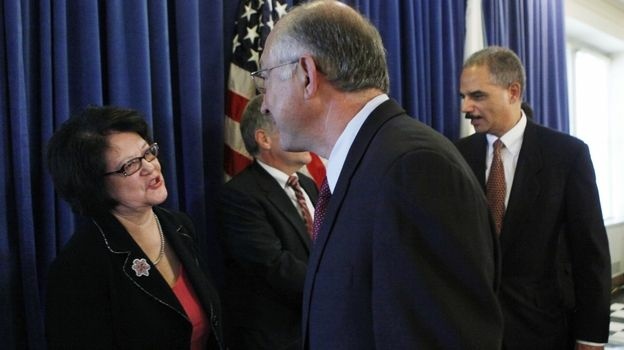 Elouise Cobell, a member of Montana's Blackfeet Tribe, and four other Native Americans led a class-action land use lawsuit against the U.S. government. Cobell is shown here in 2009 with Interior Secretary Ken Salazar after an announcement on the settlement of the lawsuit. Cobell died last year.