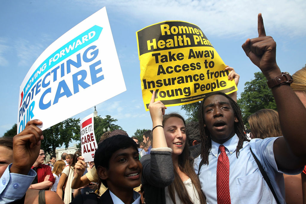 Health Care Supporters of the Affordable Care Act celebrate the Supreme Court ruling which upheld the whole healthcare law of the Obama Administration.