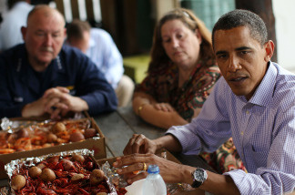 File photo: President Barack Obama and Adm. Thad Allen talk with community representatives at Grand Isle, Louisiana on June 4, 2010. The President has visited the area three times since the BP oil spill in April.