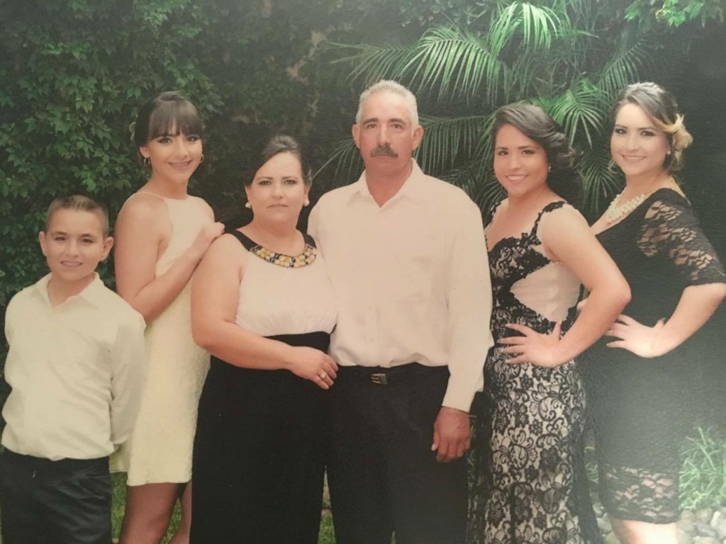 Formal Romo family photo The most recent Romo family photo. Carol Romo pictured on the far right.