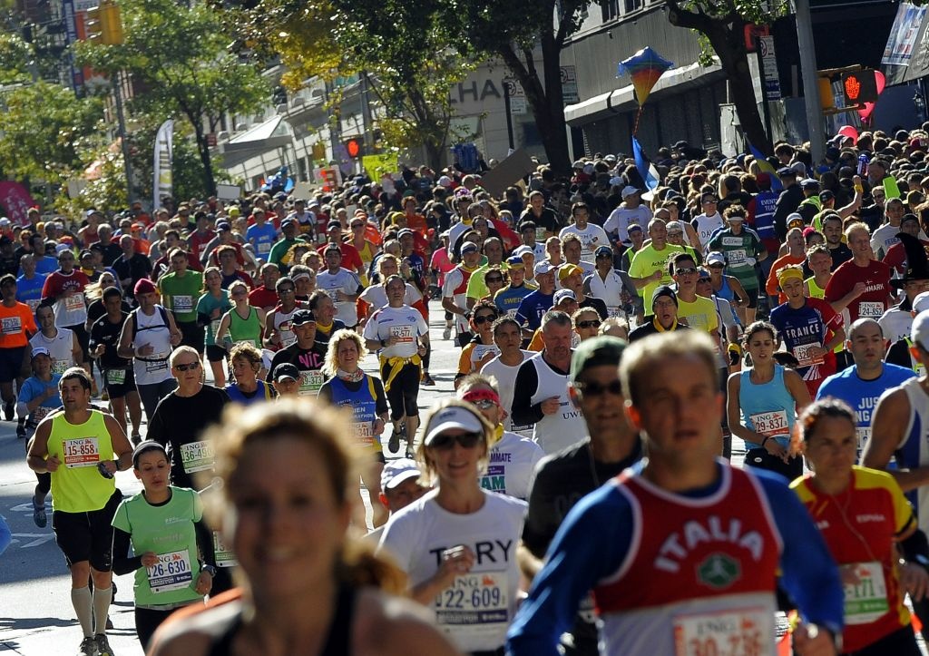 Runners make their way up 1st Avenue in Runners make their way up 1st Avenue in Manhattan during the 2011 ING New York City Marathon in New York November 6, 2011. The 26.2 mile marathon course is through the five bouroughs of New York City and is one of the largest in the world.