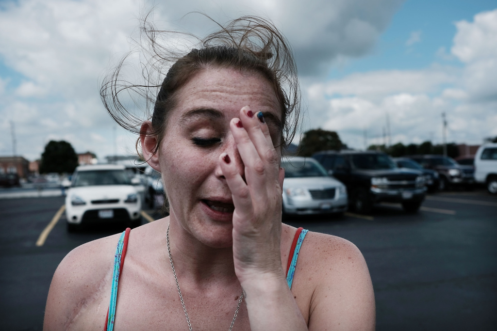 March And Rally Held Calling On Increased Federal Efforts Combatting Nation's Opioid Crisis Purity, a heroin addict who wants to quit, attends a march through the streets of Norwalk, Ohio against the epidemic of heroin in the community on July 14, 2017.