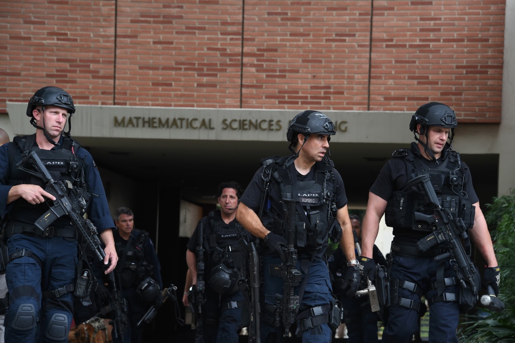 US-CRIME-SHOOT-UCLA-SHOOTING Los Angeles Police Department officers patrol the University of California Los Angeles (UCLA) campus after a shooting, June 1, 2016, in Los Angeles, California.
Two people were confirmed dead on Wednesday following a shooting at the University of California's Los Angeles campus, police said.