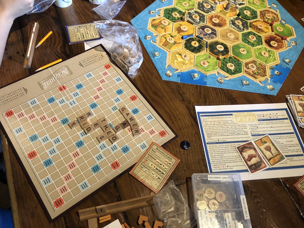 Game Haus 4 After finishing Monopoly, Yeon Kim, Mark Yang, and their friends moved on to Catan, but their secondary game Scrabble is still going strong
