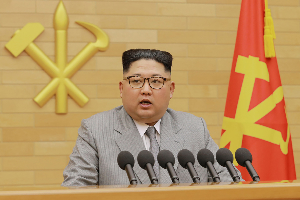NKOREA-MILITARY-NUCLEAR This picture from North Korea's official Korean Central News Agency (KCNA) taken and released on January 1, 2018 shows North Korean leader Kim Jong-Un delivering a New Year's speech at an undisclosed location.