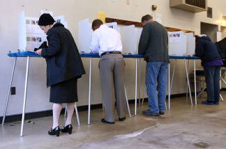 Voters fill out ballots at a polling place in a fire station June 8, 2010 in Oakland, California.