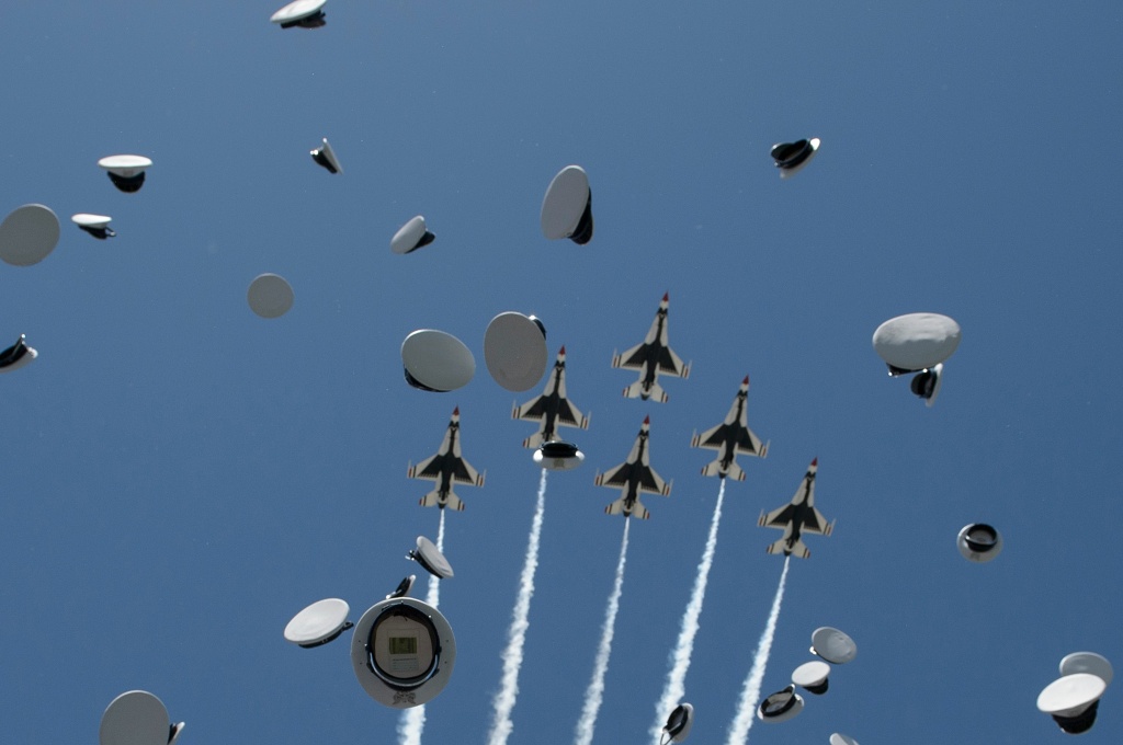 US-POLITICS-OBAMA-AIRFORCE Cadets caps and Air Force Thunderbirds are seen during a graduation ceremony at the US Air Force Academy's Falcon Stadium June 2, 2016 in Colorado Springs, Colorado. President Barack Obama gave the commencement speech at the academy.