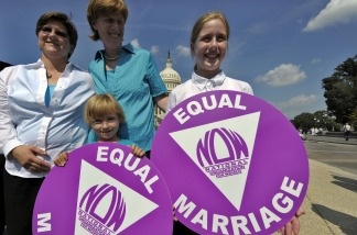Jen and Dawn Barbouroske pose with their daughters McKinley and Bre on Sept. 15, 2009, following a news conference with married same-sex couples on legislation to repeal the Defense of Marriage Act outside the Capitol Hill in Washington, DC. The Obama Administration announced on Feb. 23, 2011, that it will no longer defend the federal ban on same-sex marriage.