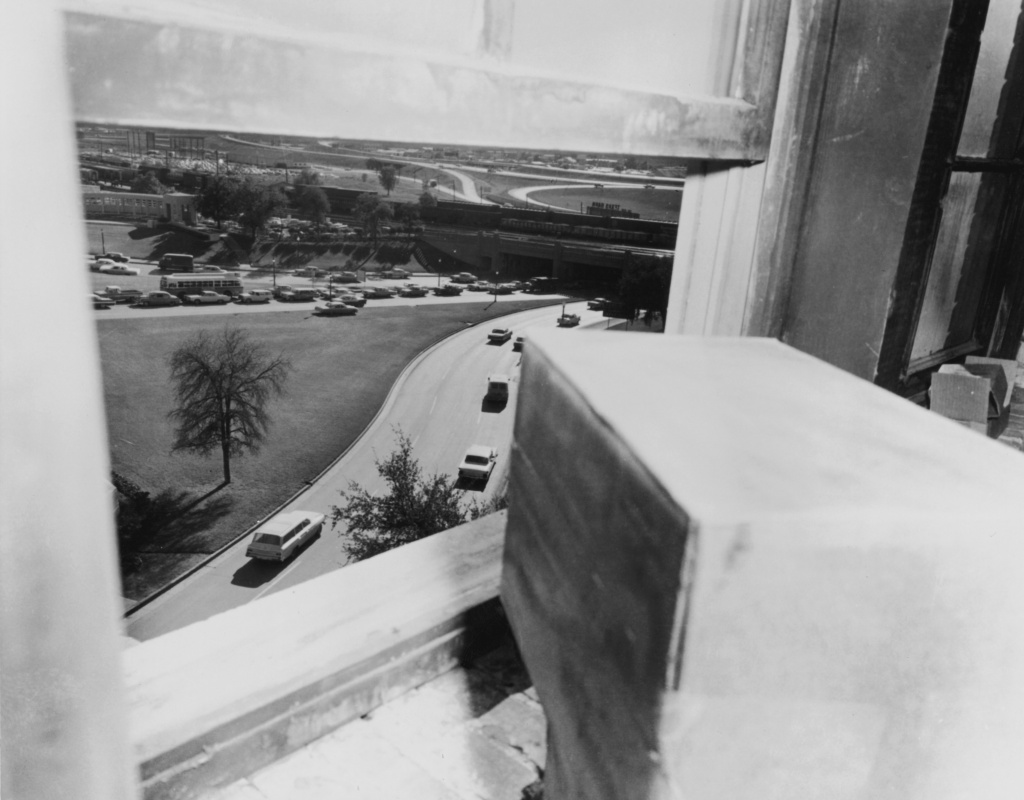 Sniper's Perch The view from the sixth floor window of the Texas School Book Depository in Dallas, from which Lee Harvey Oswald is thought to have assassinated President John F. Kennedy, 22nd November 1963. This photograph was taken approximately one hour after the assassination.