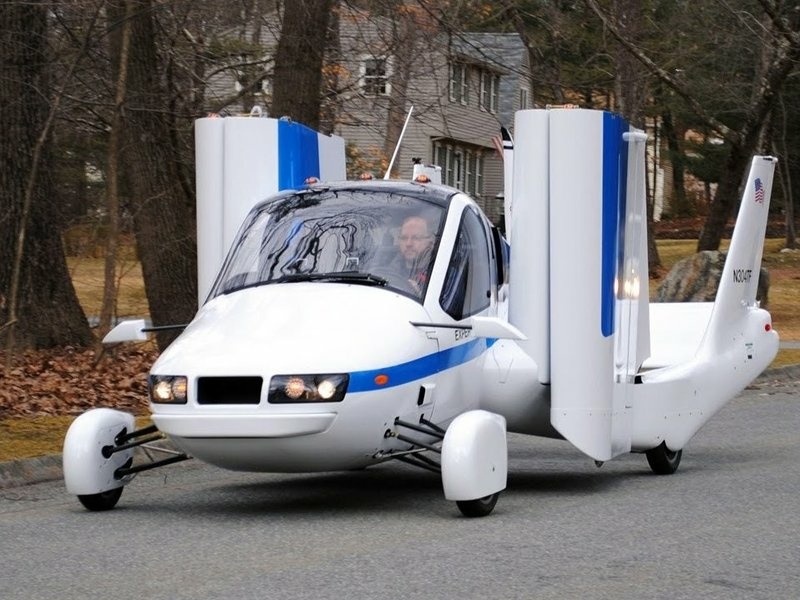 The Terrafugia Transition extends its fold-up wings when it hits the runway. The Terrafugia Transition extends its fold-up wings when it hits the runway.