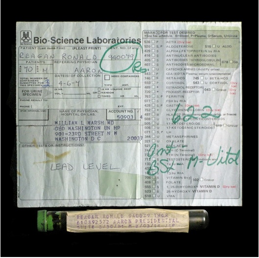 A screen grab from PFC Auctions shows a glass vial which was purportedly used to hold a sample of President Ronald Reagan’s blood after an assassination attempt in 1981. A screen grab from PFC Auctions shows a glass vial which was purportedly used to hold a sample of President Ronald Reagan’s blood after an assassination attempt in 1981.