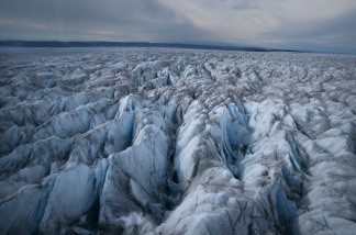 Mercer 10658 An aerial view of the Greenlandic Icecap, august 28, 2007 near Ilulissat, Greenland. Scientists believe that Greenland, with its melting ice caps and disappearing glaciers, is an accurate thermometer of global warming.