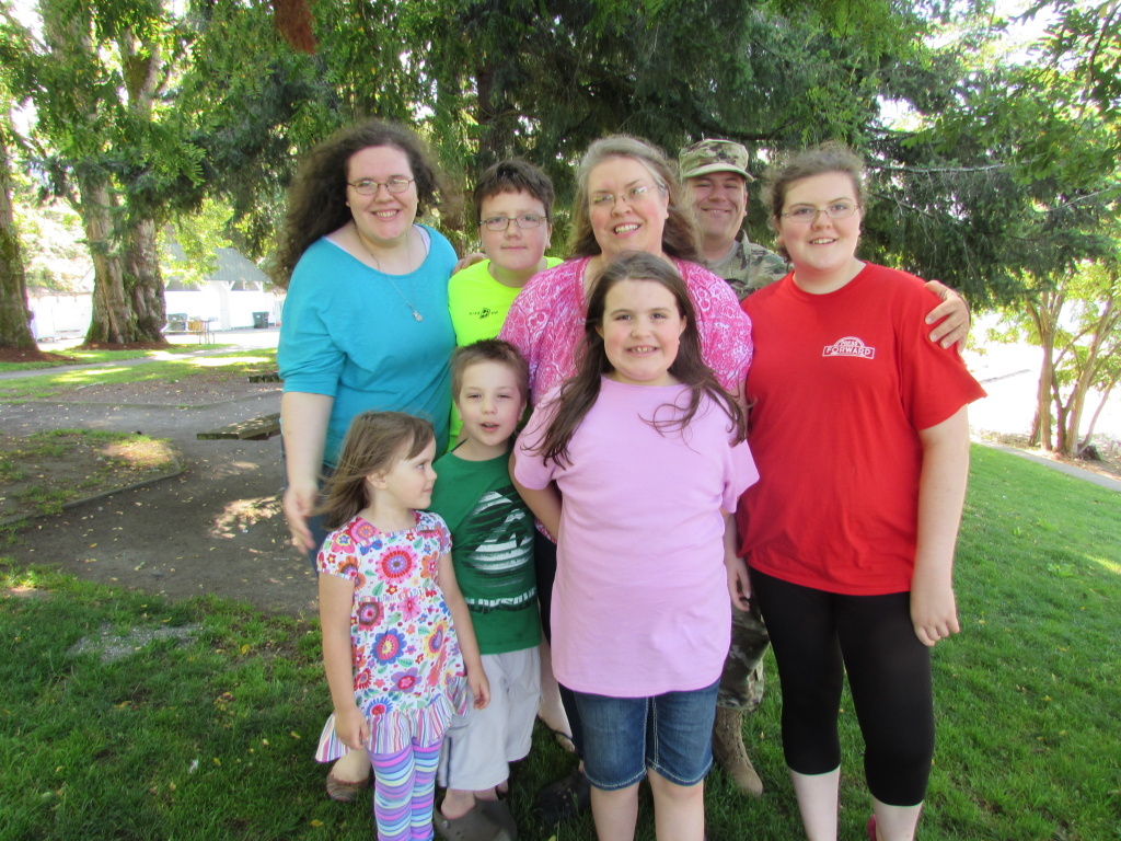 Vet homeschooling Sgt. Tim Owen and his wife Rebecca pose with six of their seven children. All have been homeschooled.