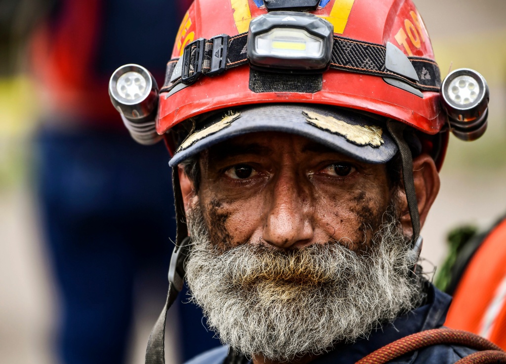 MEXICO-QUAKE-MORALES Commander General of the Moles Carlos Morales Cienfuegos, is seen during a break in the rescue works in Mexico City, on September 23, 2017, four days after the powerful quake that hit central Mexico.
In the capital, the quake toppled 39 buildings, mostly in a central area with older construction that is popular with tourists and foreigners living in the city, and also in the south. / AFP PHOTO / RONALDO SCHEMIDT (Photo credit should read RONALDO SCHEMIDT/AFP/Getty Images)