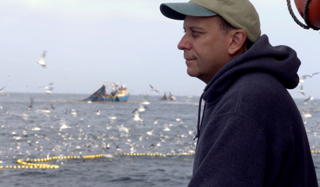 Paul Greenberg looks out at an anchoveta fleet in Peru. The fish is mostly ground up for use as feed on animal and fish farms. Paul Greenberg looks out at an anchoveta fleet in Peru. The fish is mostly ground up for use as feed on animal and fish farms.