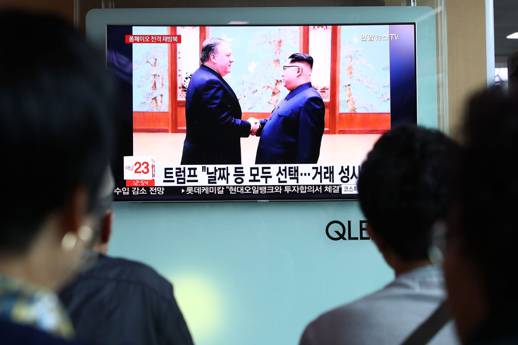 People React To U.S. State Secretary Pompeo's North Korea Visit South Koreans watch on a screen reporting the U.S. Secretary of State Mike Pompeo visit to North Korea at the Seoul Railway Station on May 9, 2018 in Seoul, South Korea. The U.S. President Donald Trump announced today that the U.S. Secretary of State Mike Pompeo is on his way to North Korea to finalise plans for the summit with his North Korean counterpart Kim Jong-Un. It is Pompeo's second trip to Pyongyang after a meeting with Kim last month as CIA director.