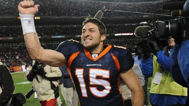 Denver Broncos quarterback Tim Tebow (15) celebrates after beating the Pittsburgh Steelers 29-23 in overtime of an NFL wild card playoff football game Sunday, Jan. 8, 2012, in Denver.