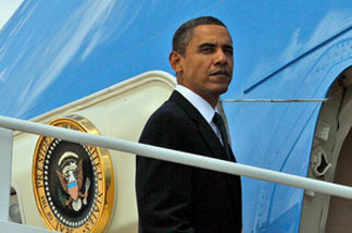 President Obama boards Air Force One at Andrews Air Force Base, Md., on Tuesday. Obama was headed to California for a fundraiser for Sen. Barbara Boxer.