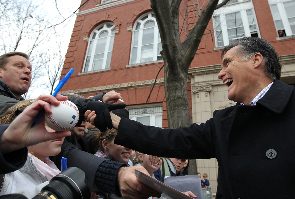 Romney Campaigns With Pawlenty And Christie In New Hampshire ROCHESTER, NH - JANUARY 08: Republican presidential candidate former Massachusetts Gov. Mitt Romney greets supporters after he spoke at a campaign rally at the Rochester Opera House on January 8, 2012 in Rochester, New Hampshire. With days to go before the New Hampshire primary, Mitt Romney is making a final campaign swing through the state. (Photo by Justin Sullivan/Getty Images)