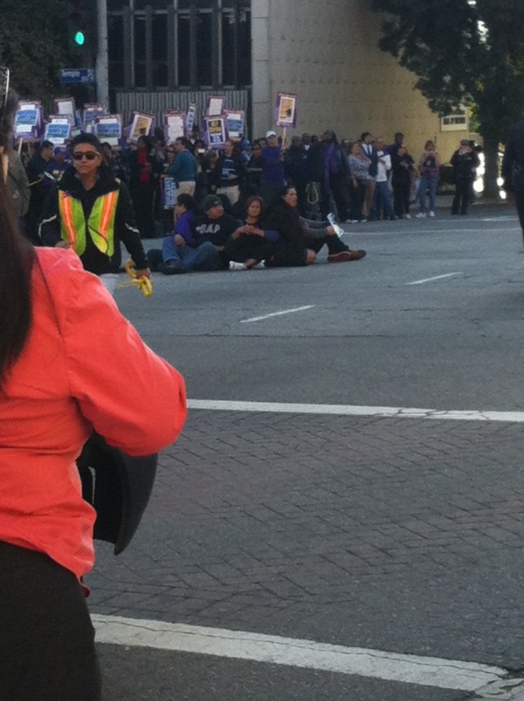 L.A. County social workers and supporters are seen in the street during a sit-in protest Thursday, December 10, 2013. Seven people were arrested.