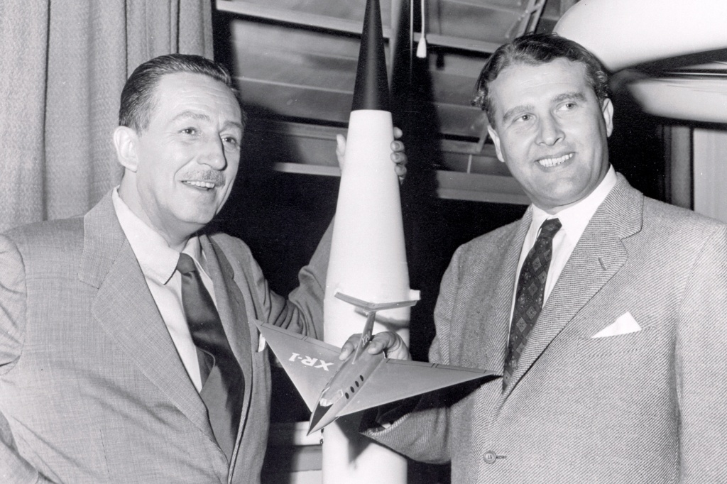 Walt Disney and Wernher von Braun, seen in a publicity photo. Walt Disney and Wernher von Braun, seen in a publicity photo.