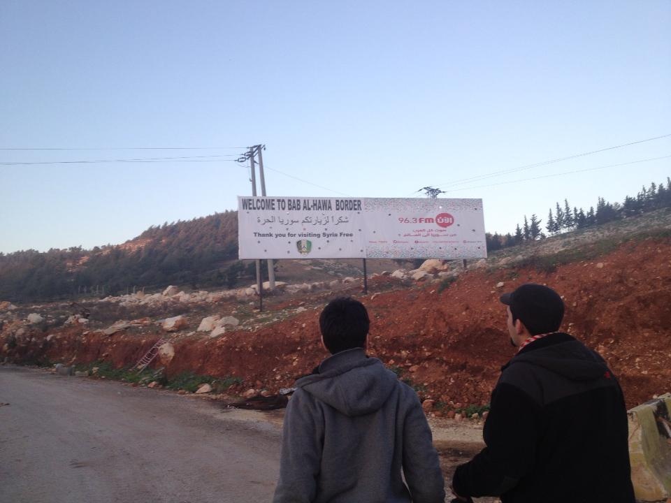 A couple of activists with the Syrian American Council head towards the Turkey-Syria border. A couple of activists with the Syrian American Council head towards the Turkey-Syria border.
