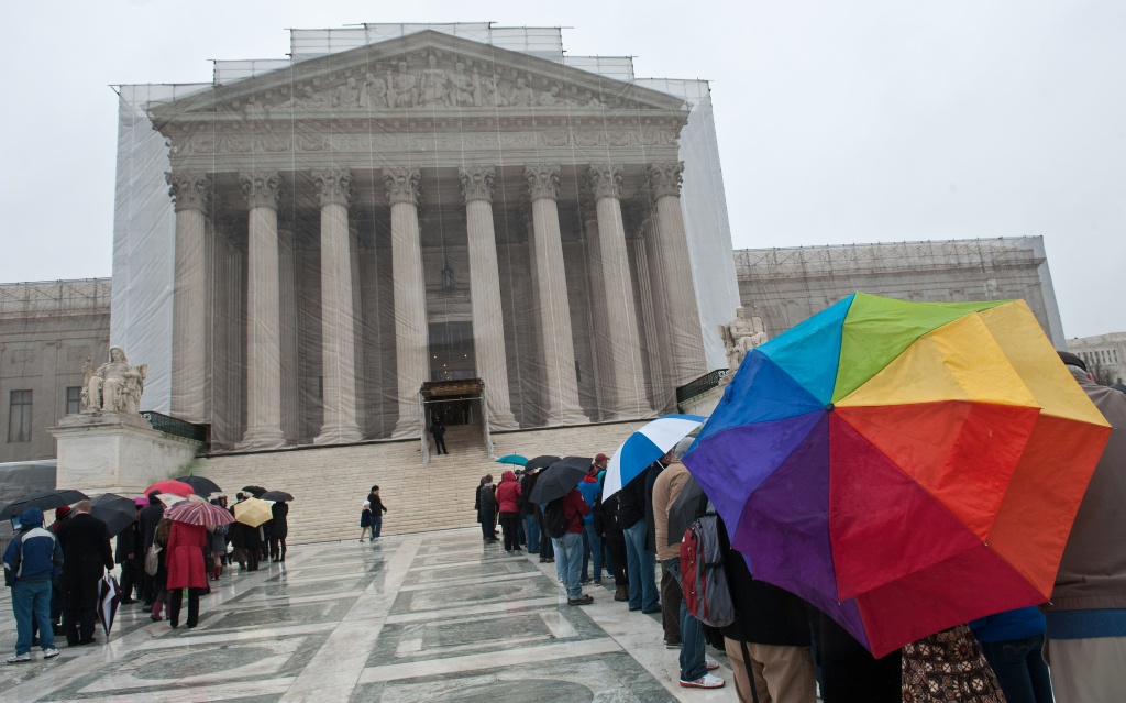 US-JUSTICE-GAY-MARRIAGE People queue to enter the Supreme Court in Washington in March 2013. The justices were hearing arguments on California's Proposition 8 ban on same-sex marriage and on the federal Defense of Marriage Act. Today, The Supreme Court blocked further same-sex marriages in Utah while state officials appeal a decision allowing such unions.
