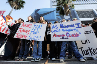Armenian activists rally outside the Turkish Consulate General on the 94th anniversary commemoration of the Armenian Genocide on April 24, 2009 in Los Angeles, California. The Armenians and Turkish officials disagree over the use of the term genocide in describing the mass killings of Armenians in 1915. Ottoman authorities arrested about 250 Armenian intellectuals and leaders in Constantinople in April 24, 1915 just before the Ottoman military forced Armenians to march hundreds of miles to what is now Syria. Massacres and sexual attacks against the Armenians were widespread. The Armenian Genocide is the second most-studied case of genocide after the Holocaust.
