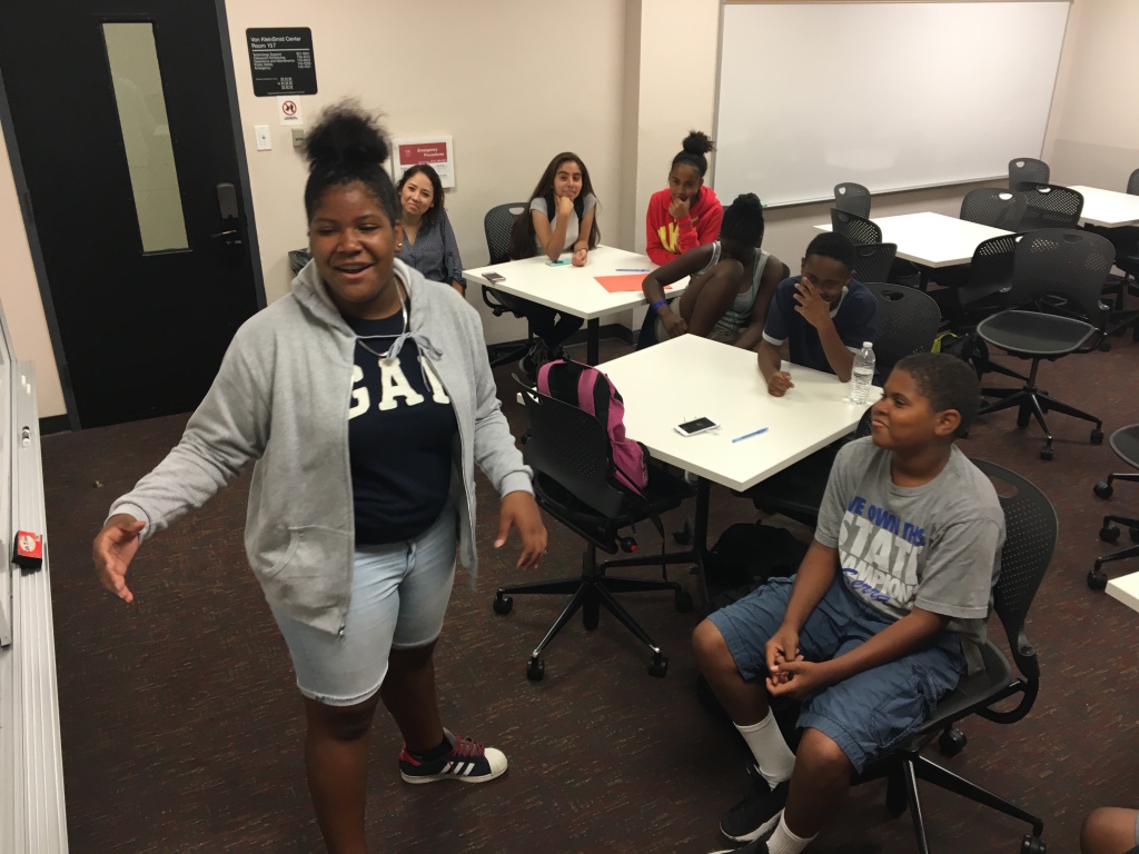 Samone Wade Performs Poem Samone Urasia Wade, 13, performs a poem about race and social justice she and a group of fellow seventh- and eighth-graders wrote together in a small classroom on the University of Southern California campus.