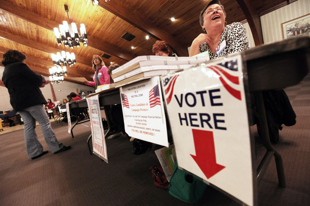 Voters Head To Polls On Super Tuesday Poll workers look on at a polling place during Super Tuesday voting on March 6, 2012 in Youngstown, Ohio. The two top Republican presidential candidates Mitt Romney and Rick Santorum are running neck and neck in the state.