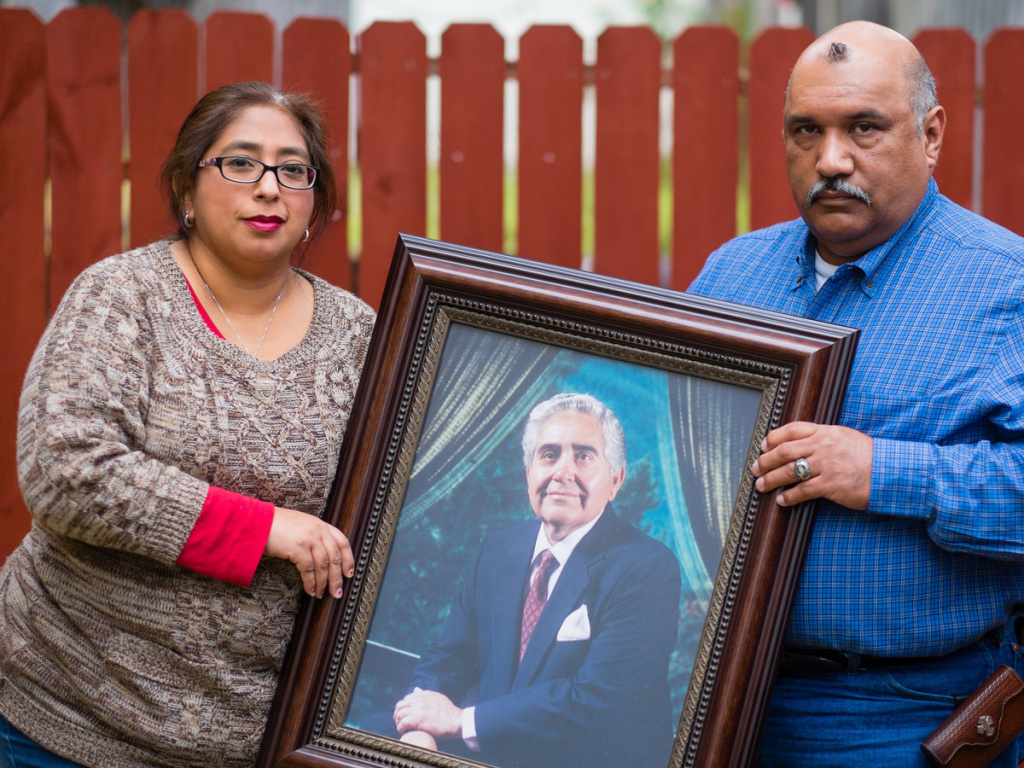 school-finance-10687-ca02575513fce6eebeddf89af4cd440958ef8785-s1200-c85.jpg Patty Rodriguez and her brother Alex hold a photo of their father, Demetrio Rodriguez, who died in 2013.