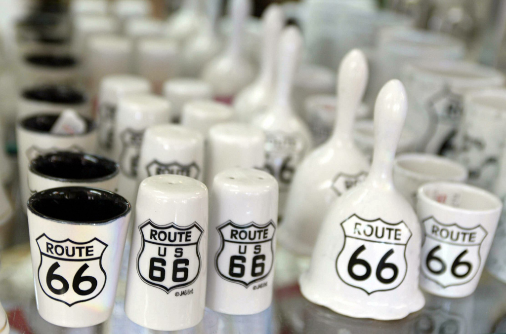 Route 66 souvenirs, including shot glass Route 66 souvenirs, including shot glasses, salt and pepper shakers and bells are for sale in a shop along the road in Elk City, Oklahoma on July 6, 2003.