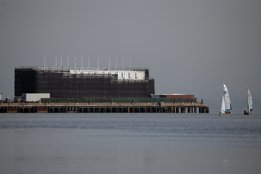 Mystery Barge Construction Project Rumored To Google Project A barge under construction is docked at a pier on Treasure Island on October 30, 2013 in San Francisco, California. Mystery barges with construction of shipping containers have appeared in San Francisco and Portland, Maine, prompting online rumors that the barges are affiliated with a Google project.