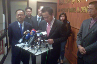 San Gabriel Mayor Albert Huang resigns at a news conference October 19, 2010