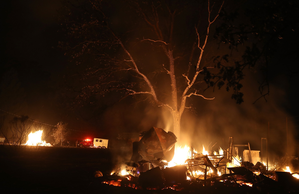 Multiple Wildfires Destroy Homes, Threaten California Wine Country A pile of furniture burns during the Nuns Fire on October 10, 2017 in Kenwood, California.