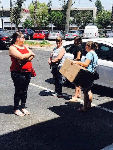 Natalie Buck (left) waits anxiously with other customers in hopes someone will find her bridesmaid dress. Natalie Buck (left) waits anxiously with other customers in hopes someone will find her bridesmaid dress.