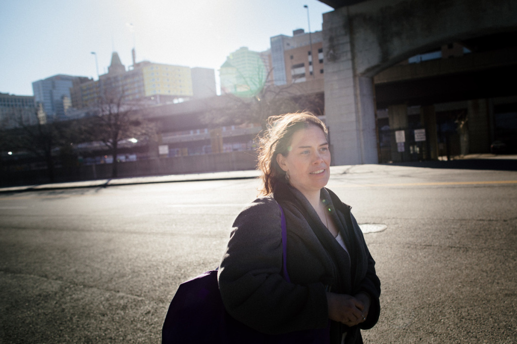 medicaid-3_enl-28be04611bed9dc30927c14baaa6e0e5cfcc2bab-s1200.jpg Athena Hanoitis leaves the Healthcare for the Homeless clinic in downtown Baltimore. Haniotis, 38, worries about losing her Medicaid coverage. She's been homeless for almost five years, staying with friends, in cars or wherever she can to avoid sleeping outside. Medical problems — including severe hyperglycemia, asthma, life-threatening food allergies and anemia — have prevented her from working. She's been getting help at the Healthcare for the Homeless clinic in Baltimore. Without Medicaid she fears the clinic won't be able to provide as many services. She also worries that her prescriptions, which are now free or very inexpensive, would become unaffordable.
Haniotis is like many people experiencing homelessness. Their health problems lead to the loss of work, then housing. But being homeless makes their health problems worse. Haniotis says there's a lot of stress.