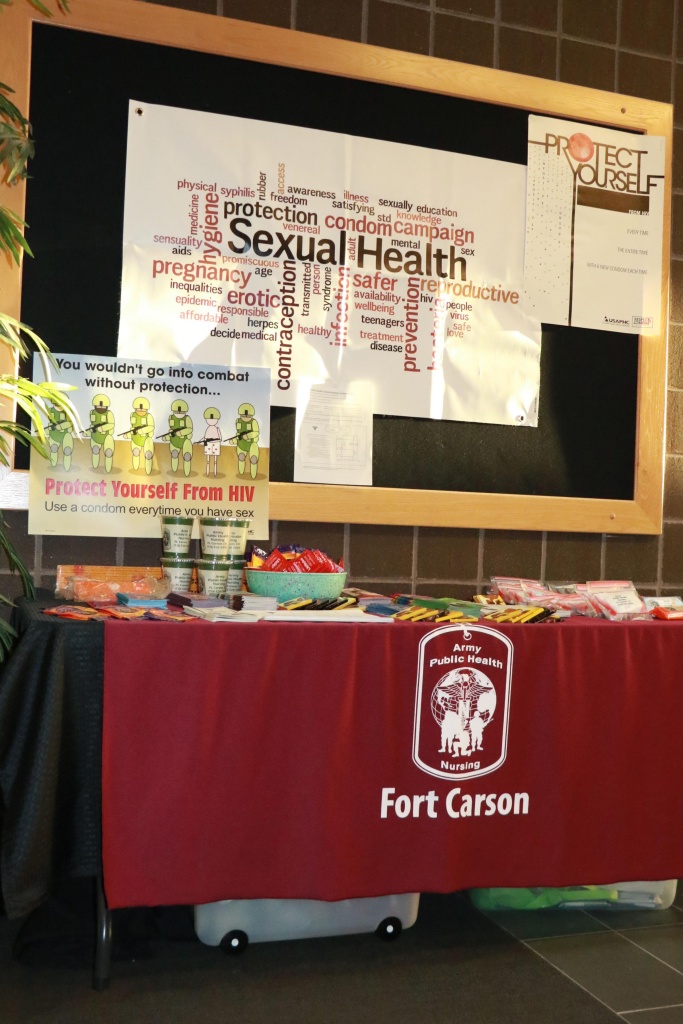 An STI prevention display at Fort Carson, Col. contained information pamphlets, male and female condoms, and contact information to receive free, confidential STI testing.