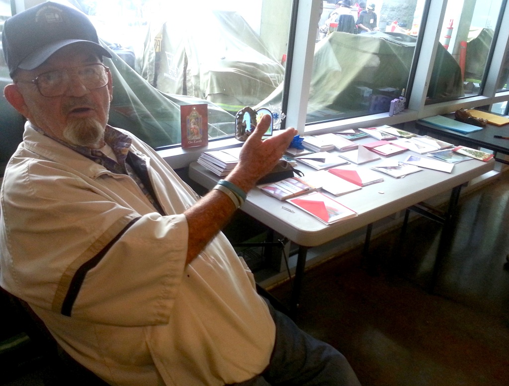 Skip Matthews and his holiday cards at the Midnight MIssion on LA's Skid Row. Matthews has been coming to the area for 20 years encouraging the homeless to send a note to a loved one.
