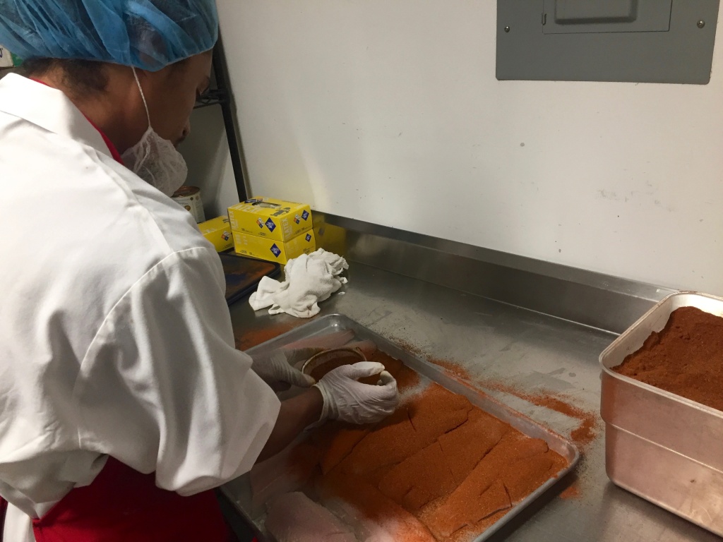 Everytable cook Andres Chopin works in the commercial kitchen, seasoning fish that will later be added to one of the chain’s pre-packaged meals. Everytable cook Andres Chopin works in the commercial kitchen, seasoning fish that will later be added to one of the chain’s pre-packaged meals.