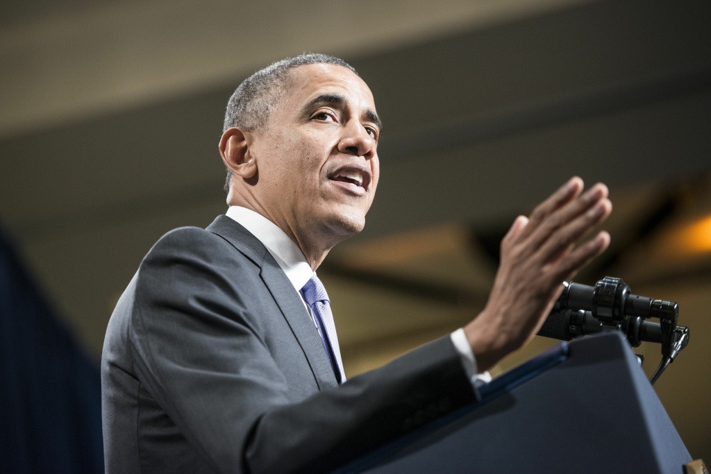 US-POLITICS-OBAMA US President Barack Obama speaks during the Democratic Issues Conference February 14, 2014 in Cambridge, Maryland. Obama spoke about goals for Democrats in the US Congress for the coming year.