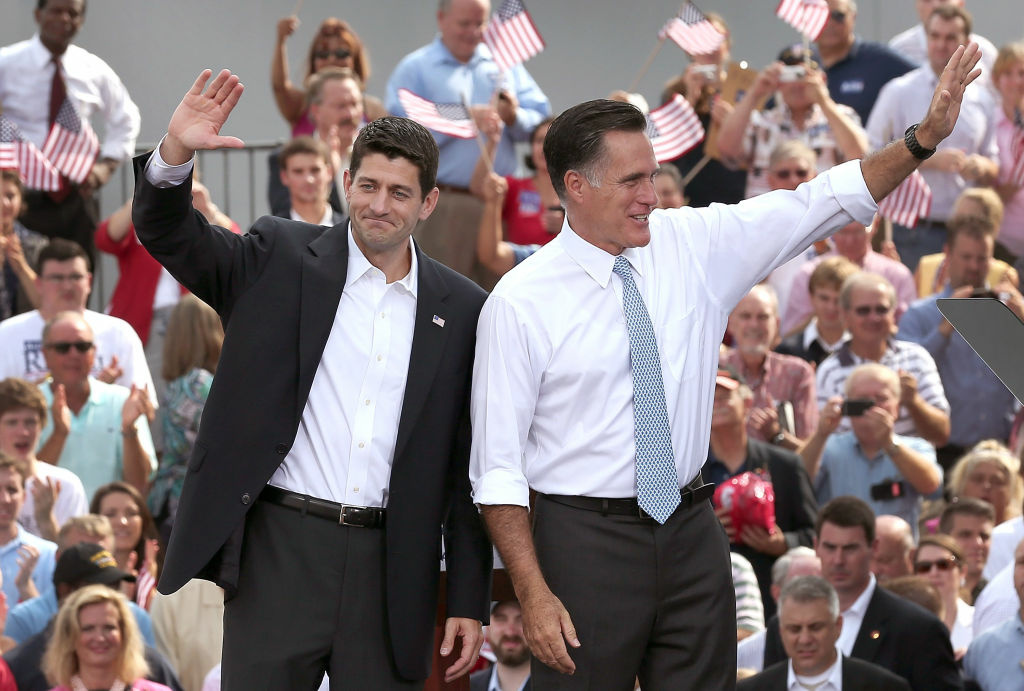 Republican Presidential Candidate Mitt Romney Announces Rep. Paul Ryan As His Vice Presidential Pick NORFOLK, VA - AUGUST 11: Republican presidential candidate, former Massachusetts Gov. Mitt Romney (R) and U.S. Rep. Paul Ryan (R-WI) wave as Ryan is announced as his vice presidential running mate in front of the USS Wisconsin August 11, 2012 in Norfolk, Virginia. Ryan, a seven term congressman, is Chairman of the House Budget Committee and provides a strong contrast to the Obama administration on fiscal policy. (Photo by Win McNamee/Getty Images)