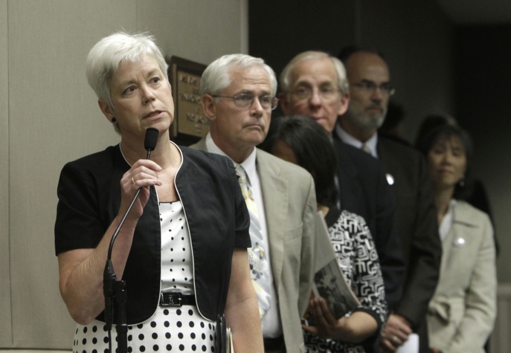 California Death Penalty Amanda Wilcox, left, accompanied by her husband Nick Wilcox, second from left, whose daughter, Laura, was killed in a 2001 Nevada County shooting spree, joined others in calling on lawmakers to approve a bill aimed at abolishing capital punishment, at a hearing of the Assembly Public Safety Committee at the Capitol in Sacramento, Calif., Thursday, July 7, 2011.