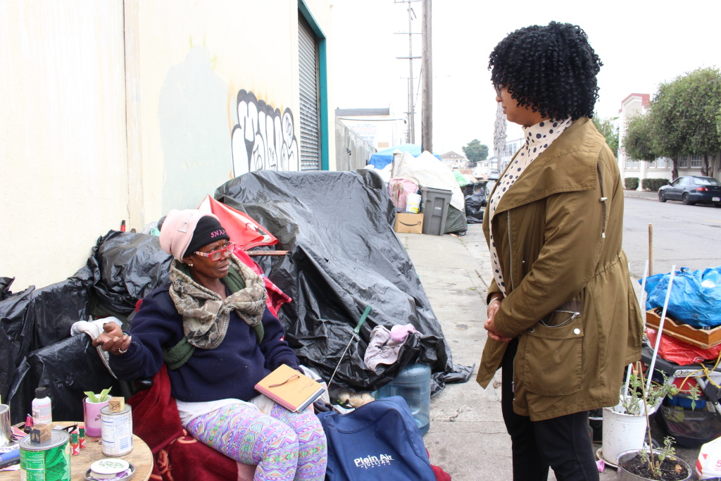 Homeless advocate Candice Elder, 34, checks in with Dorothy Smith, 65, at an encampment in Oakland on Aug. 24, 2018. Smith, who raised her children in the city, said her disability benefits are not enough to afford housing. “It just don’t support me,” she said. Homeless advocate Candice Elder, 34, checks in with Dorothy Smith, 65, at an encampment in Oakland on Aug. 24, 2018. Smith, who raised her children in the city, said her disability benefits are not enough to afford housing. “It just don’t support me,” she said.