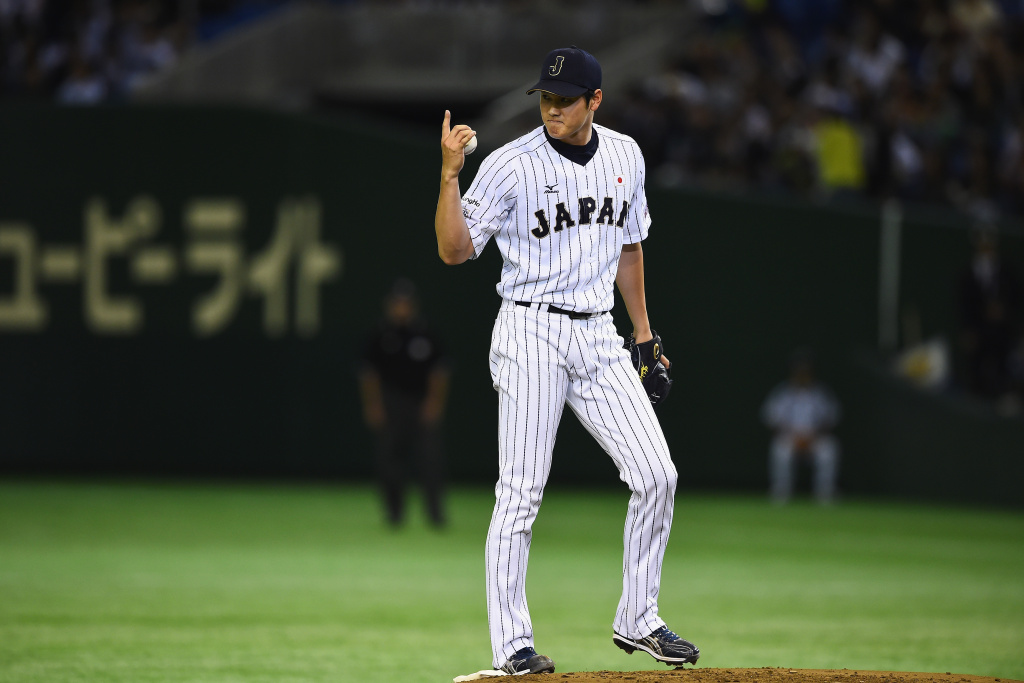 South Korea v Japan - WBSC Premier 12 Semi Final Starting pitcher Shohei Otani of Japan reacts in the top of first inning during the WBSC Premier 12 semi final match between South Korea and Japan at the Tokyo Dome on November 19, 2015 in Tokyo, Japan.