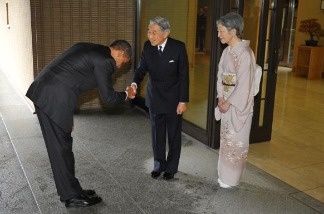 Mercer 13989 US President Barack Obama bows as he shakes hands with Japanese Emperor Akihito and as Empress Michiko looks on upon Obama's arrival at the Imperial Palace in Tokyo on November 14, 2009. The Japanese bow from the waist while the Chinese bow with the shoulders and a head nod. Obama and his team will be paying close attention to proper protocol while hosting Chinese President Hu Jintao at a state dinner Wednesday night.